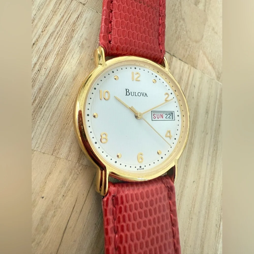 Bulova gold tone red leather watch NEW BATTERY